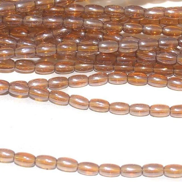 Old vow rings-brown luster trans glass oval beads 7x4mm 12 Strings