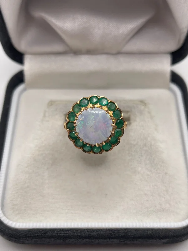 Bead row rings-14ct rose gold black opal and emerald ring