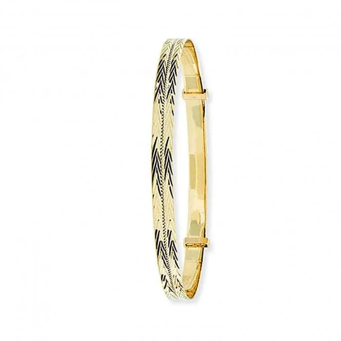 Oval shape bangles-9ct Yellow Gold Double-Cut Ladies Bangle BN409