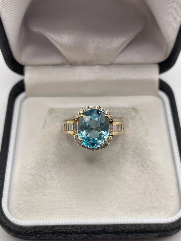 Thin filigree rings-18ct gold blue zircon and diamond ring