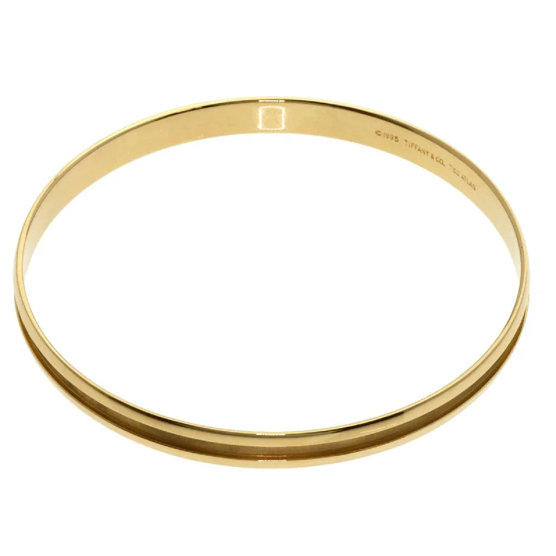 Faith charm bangles-Tiffany yellow gold (18K) Bangle (Pre-Owned)