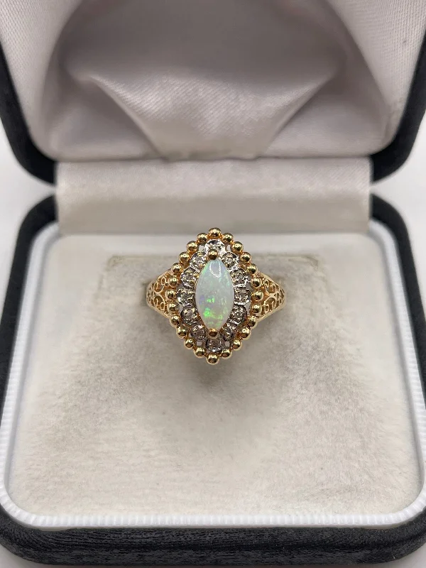 Half crescent rings-14ct gold opal and diamond ring