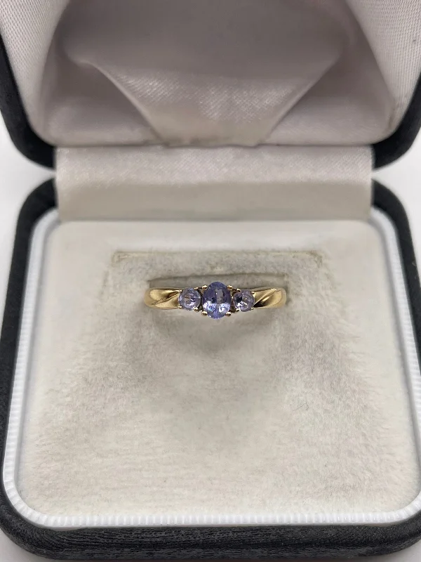 Worn cameo rings-9ct gold tanzanite ring