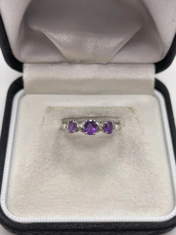 Heavy stone rings-9ct white gold amethyst and diamond ring